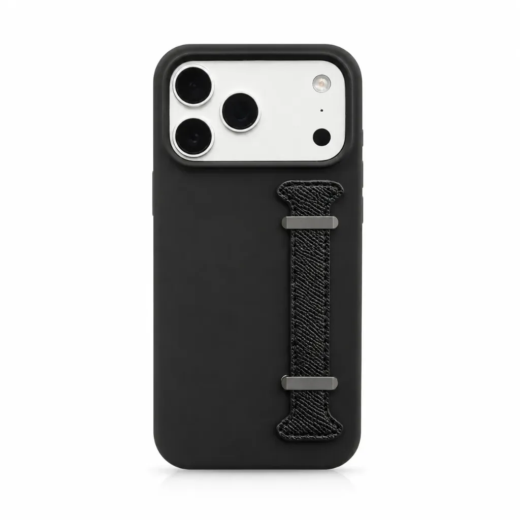 Premium Matte Silicone Cover with Textured Leather Hand Strap Grip & Metal Buckles For iPhone 17 Pro Max - درع موبايل سيليكون مطفي مع حزام يد جلدي مضلع بمشابك معدنية للايفون 17 برو ماكس