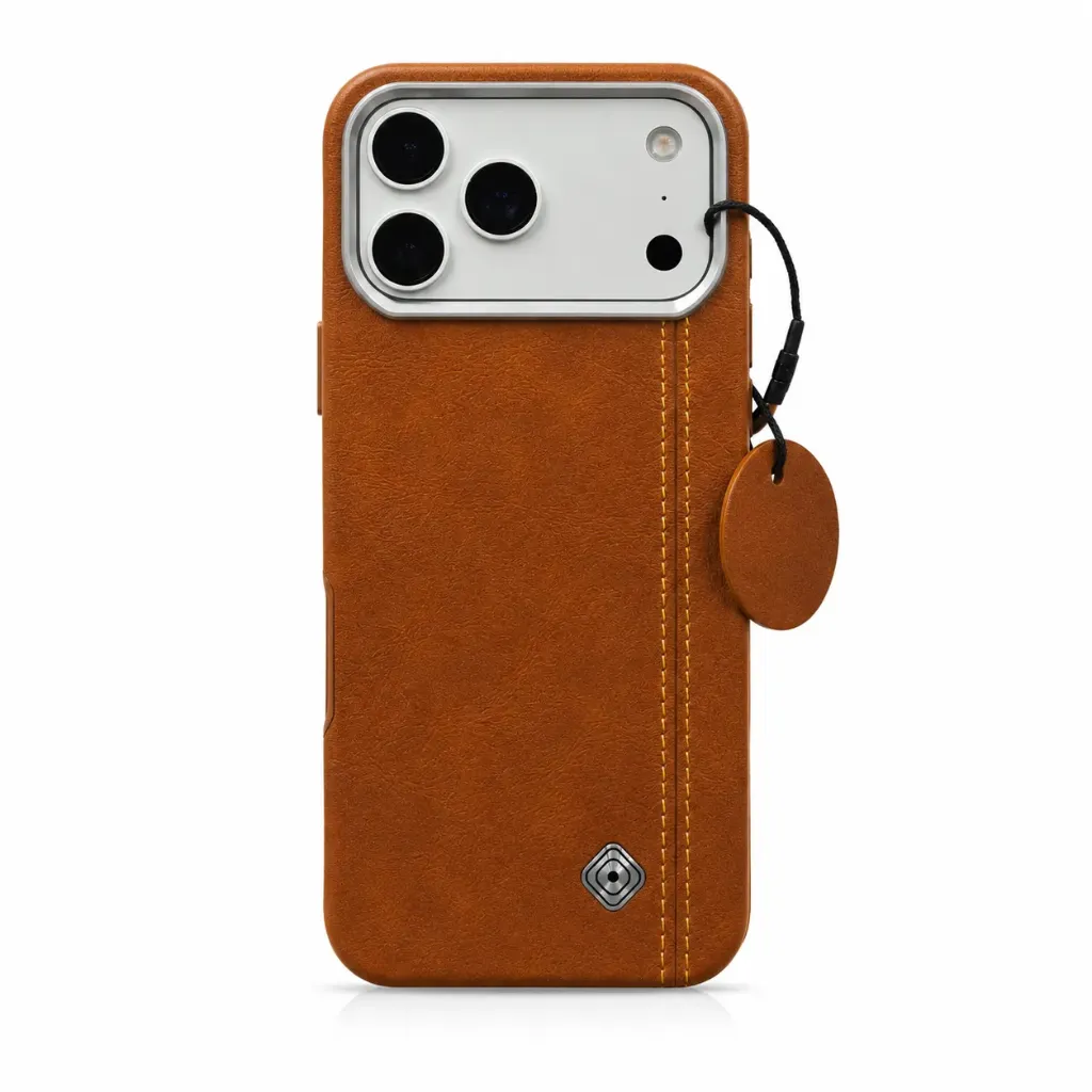 MMkio Signature Stitched Leather Cover with Elegant Tag & Metallic Frame For iPhone 17 Pro Max - درع موبايل جلدي فاخر بخياطة طولية مميزة وميدالية تعليق مع إطار كاميرا معدني للايفون 17 برو ماكس